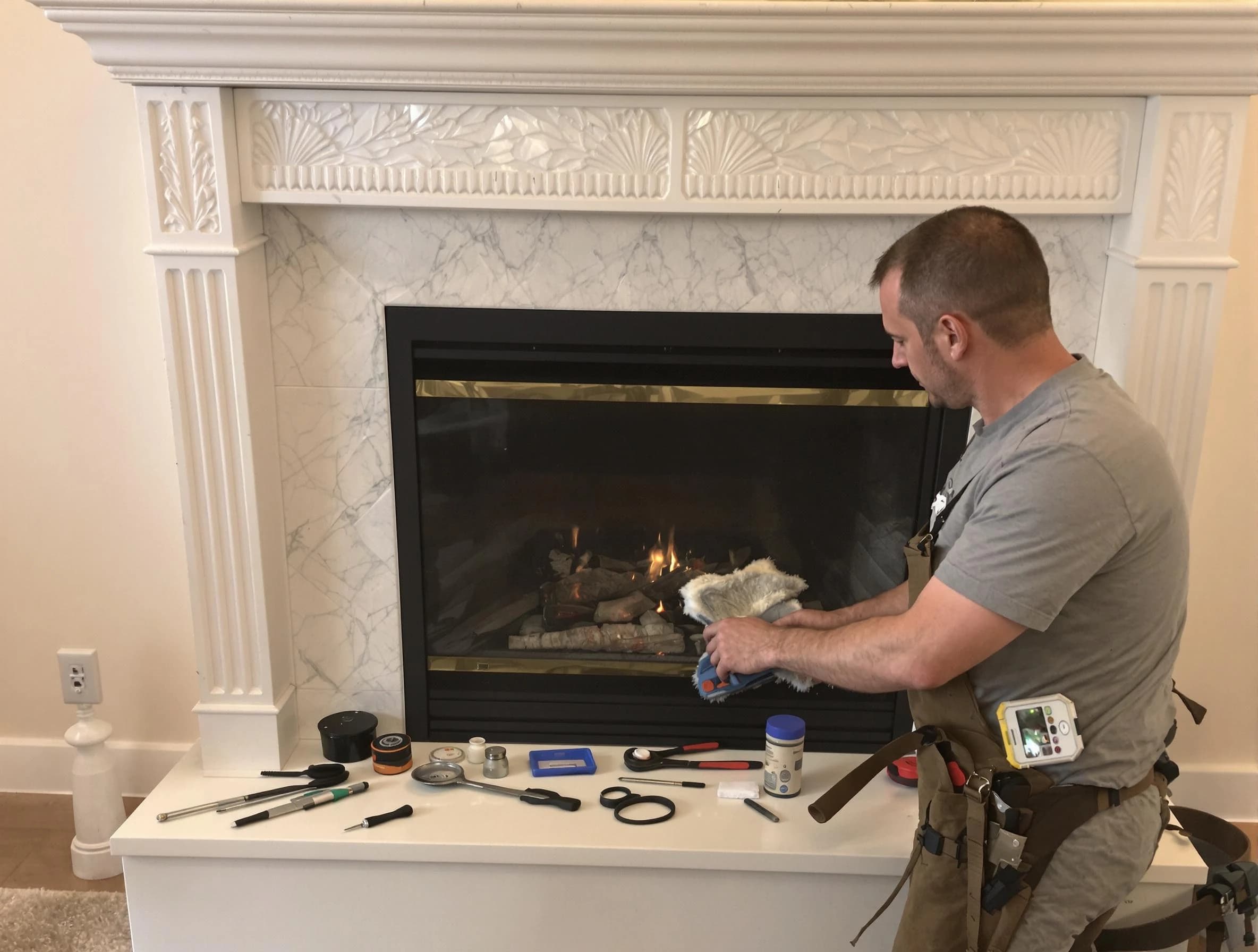 Providence Chimney Sweep performing fireplace maintenance in Providence, RI